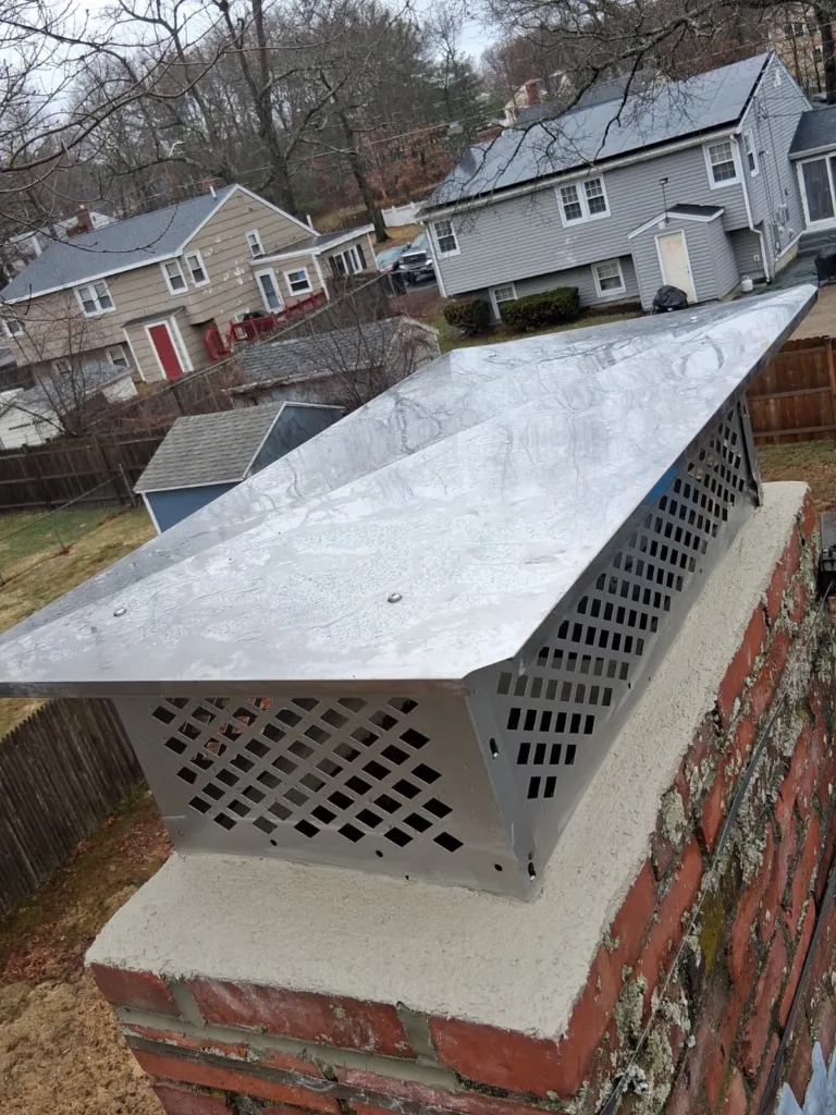 Winter chimney cap installation
