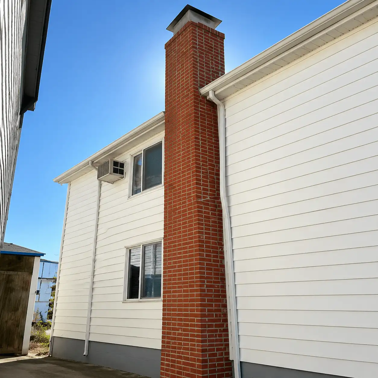 Completed red brick chimney restoration