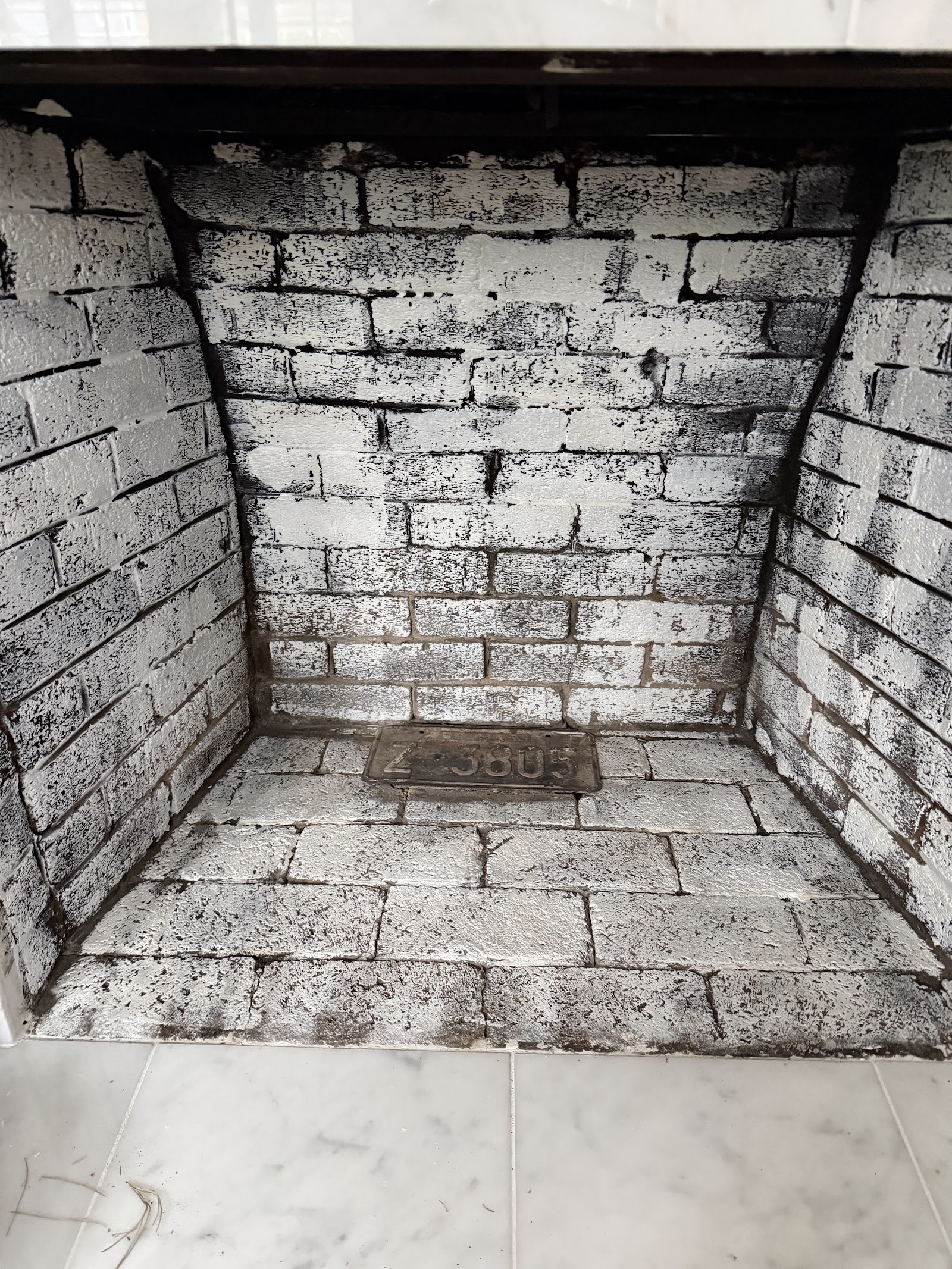 Smooth parged firebox and smoke chamber after repair by TopDog Chimney